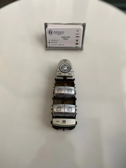 MERCEDES W213 E Serisi Sol Cam Düğme Kahverengi A2139054803 · çıkma yedek parça fotoğrafı